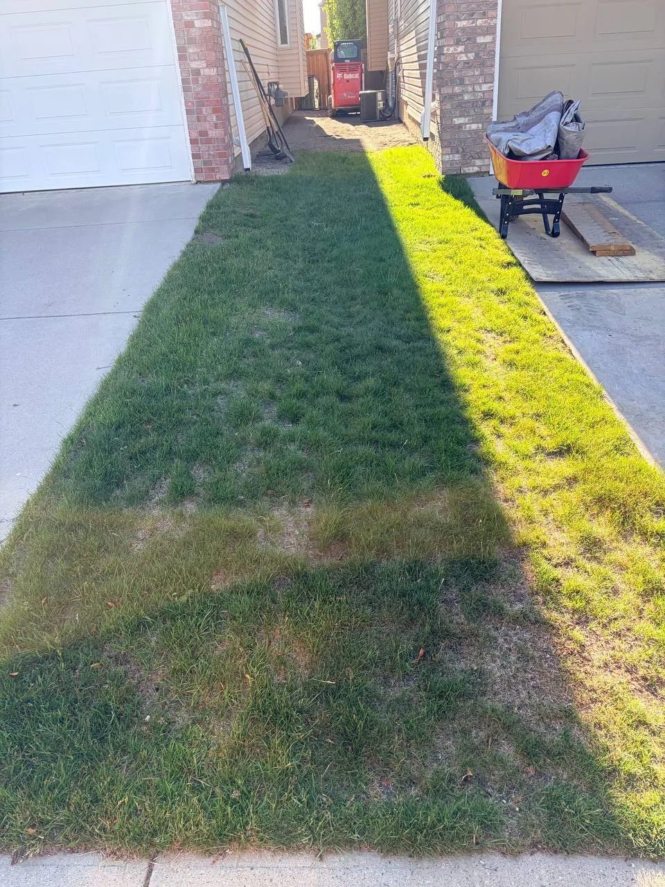 Calgary yard strip before sod removal and landscape rock installation