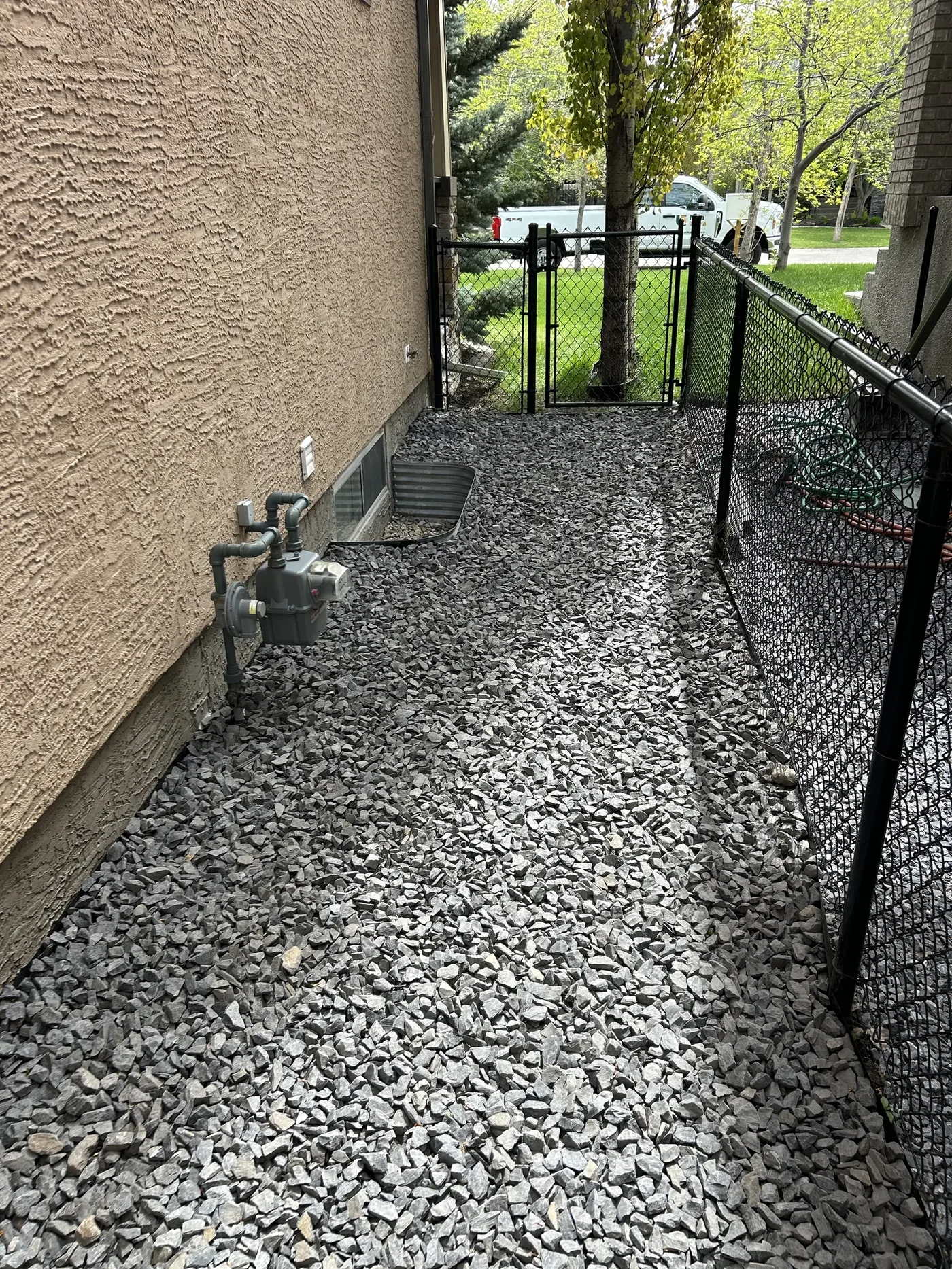 Finished entry side passage with Rundle Rock beside the foundation in Calgary
