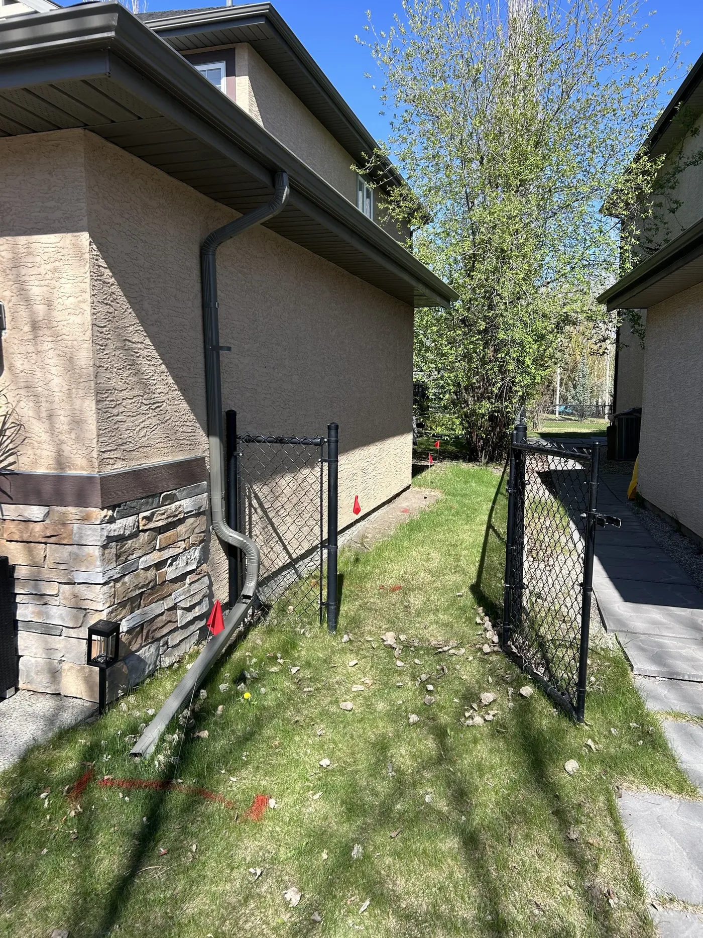 Front gate approach before grading and rock installation in Calgary