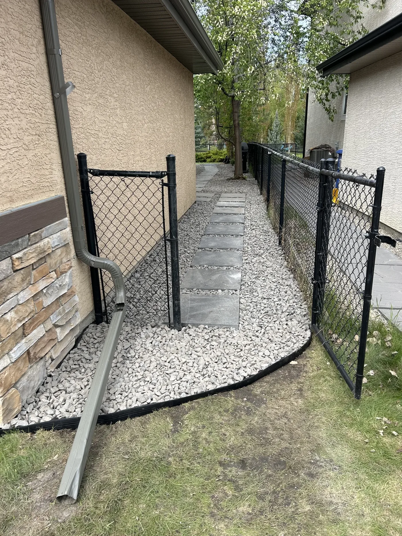 Finished front gate approach with Rundle Rock and stepping stones in Calgary