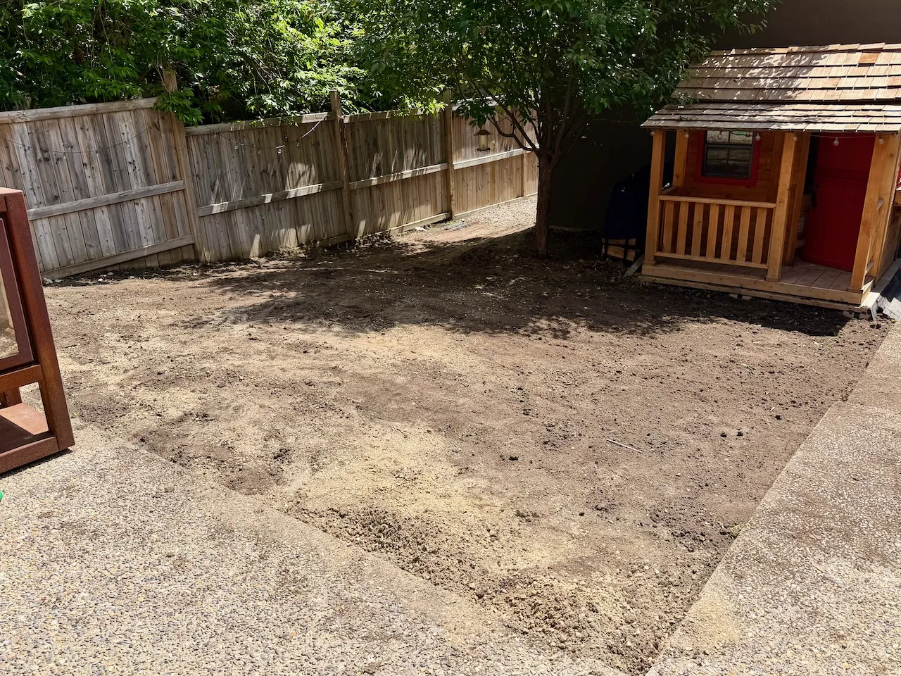 Southwest Calgary backyard ready for landscaping after topsoil removal